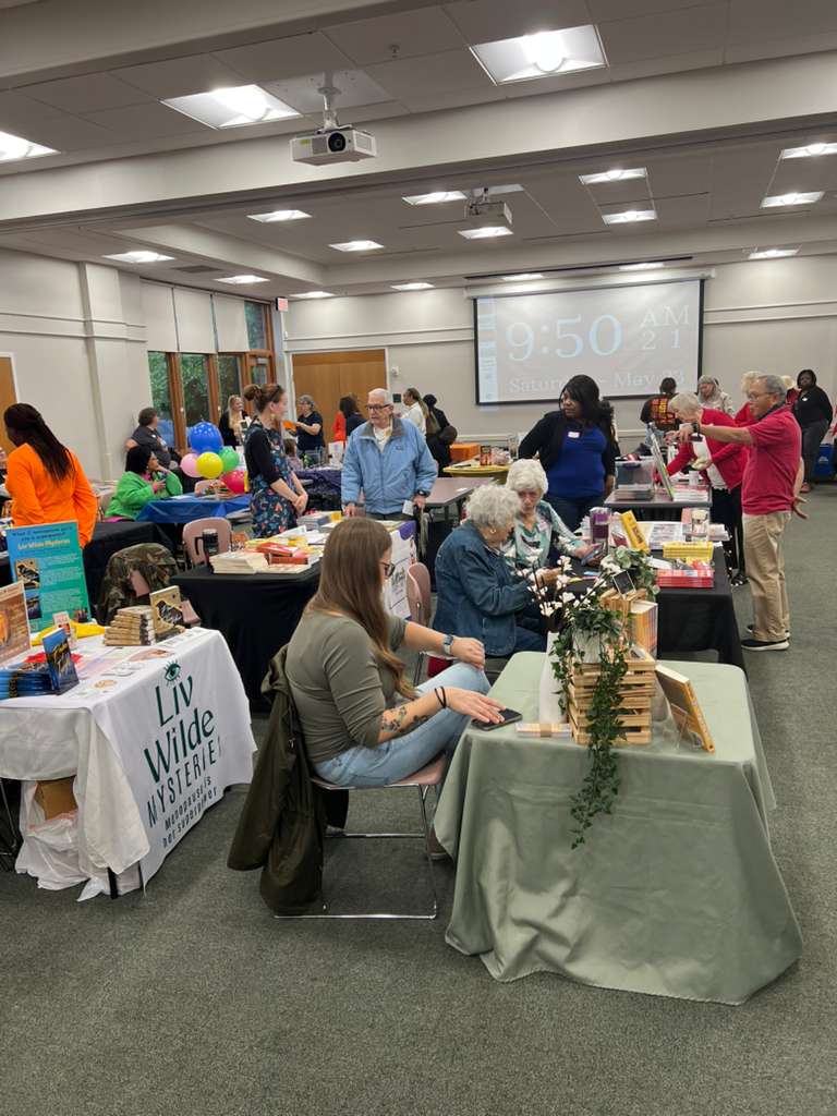 Authors displaying books at Local Authors Festival Salem Church Library May 2026
